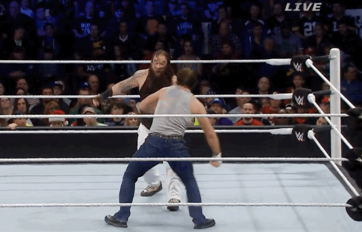 Bray Wyatt clotheslines Dean Ambrose